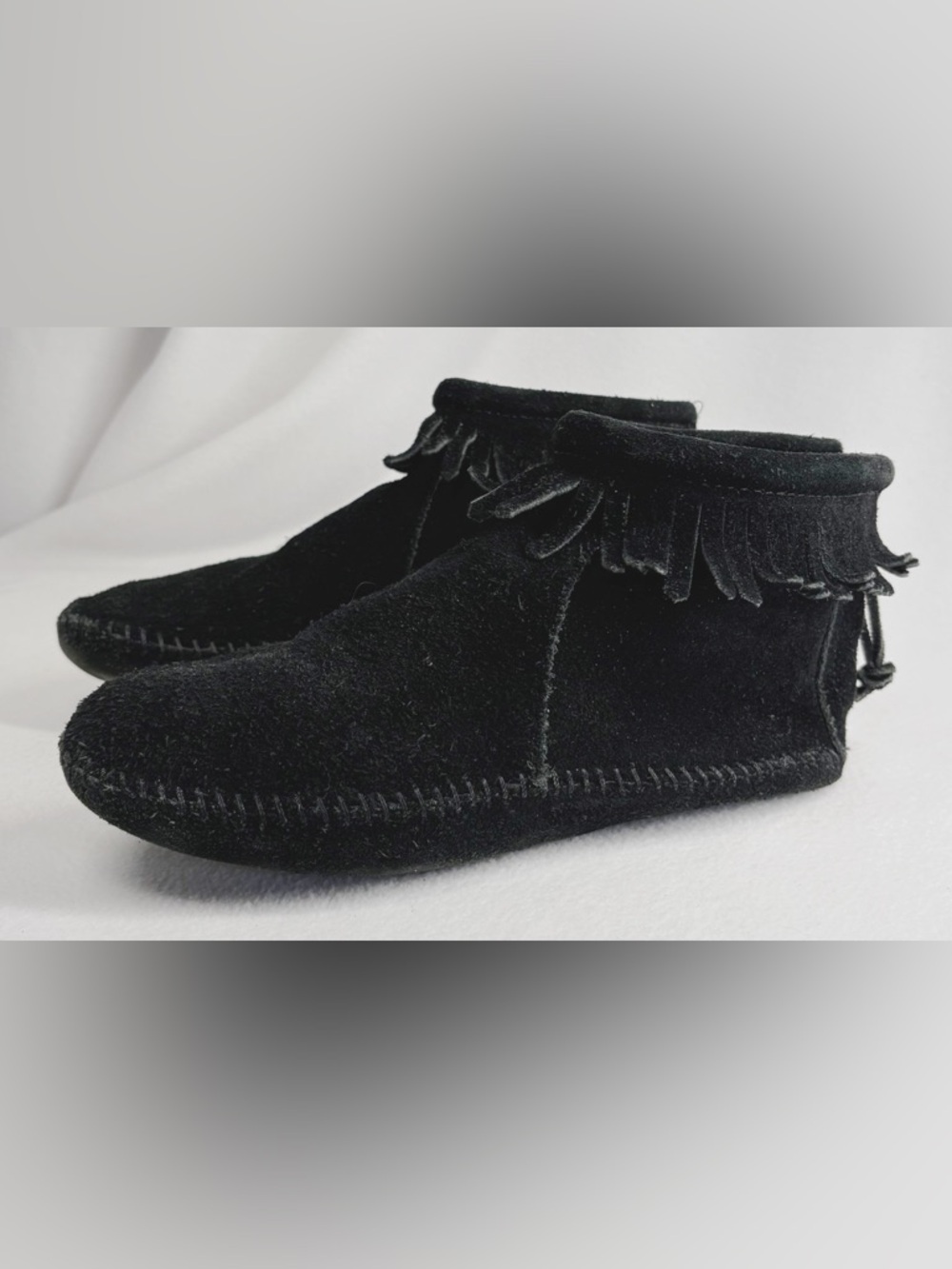 Minnetonka Black Suede Fringe Ankle Booties